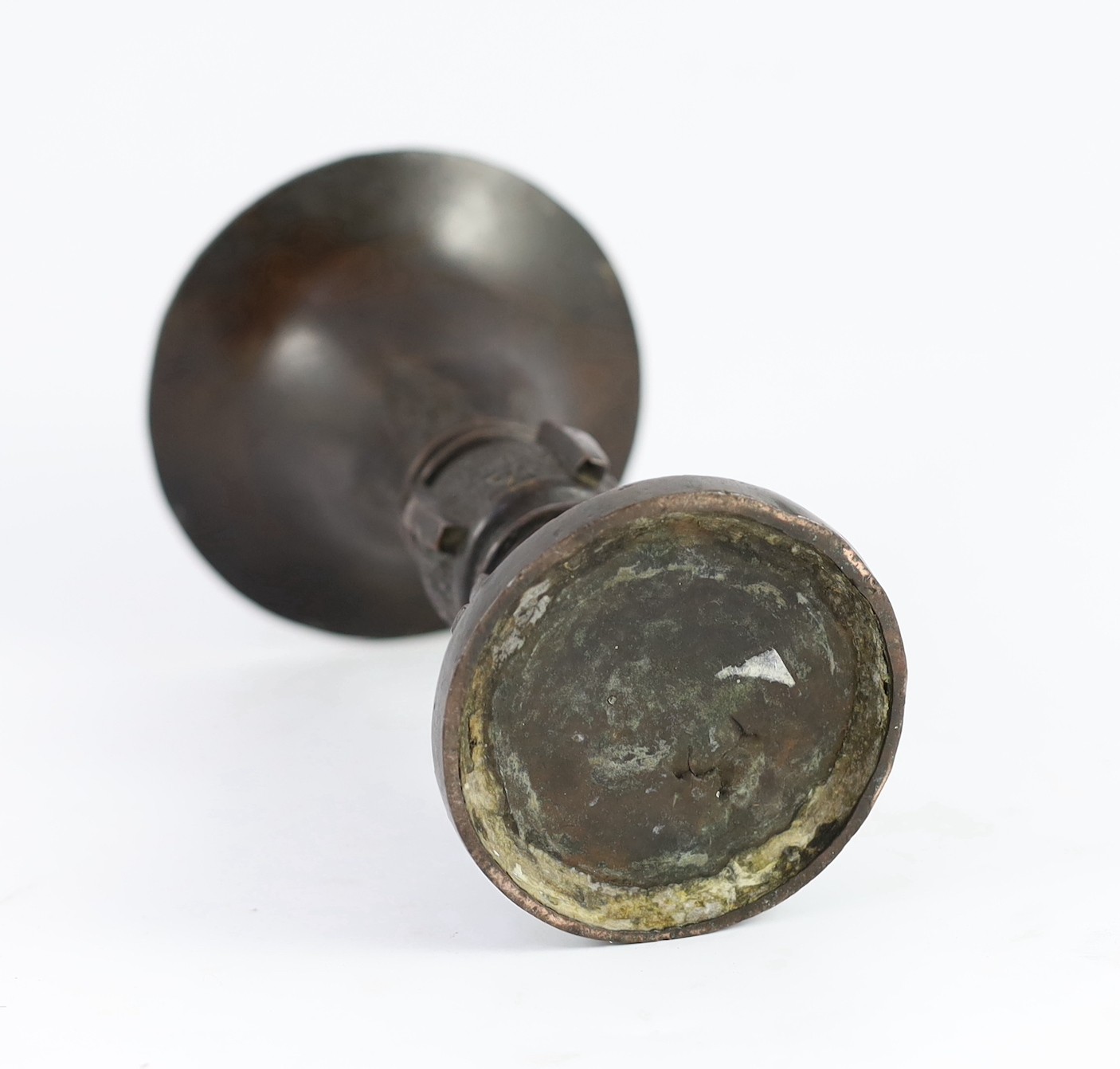 A Chinese archaistic bronze beaker vase, gu, Ming dynasty, 19.2cm high